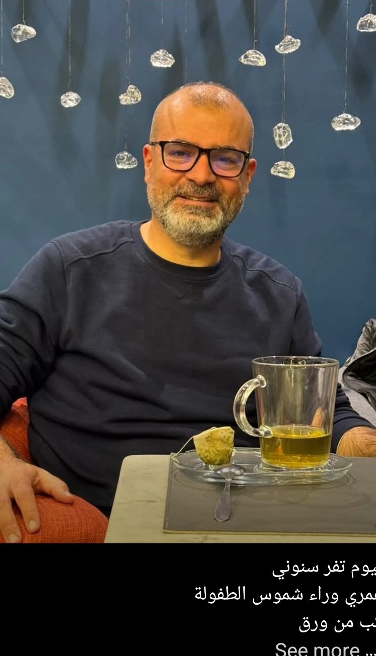 خلف الغيوم     شعر:د. علي نسر